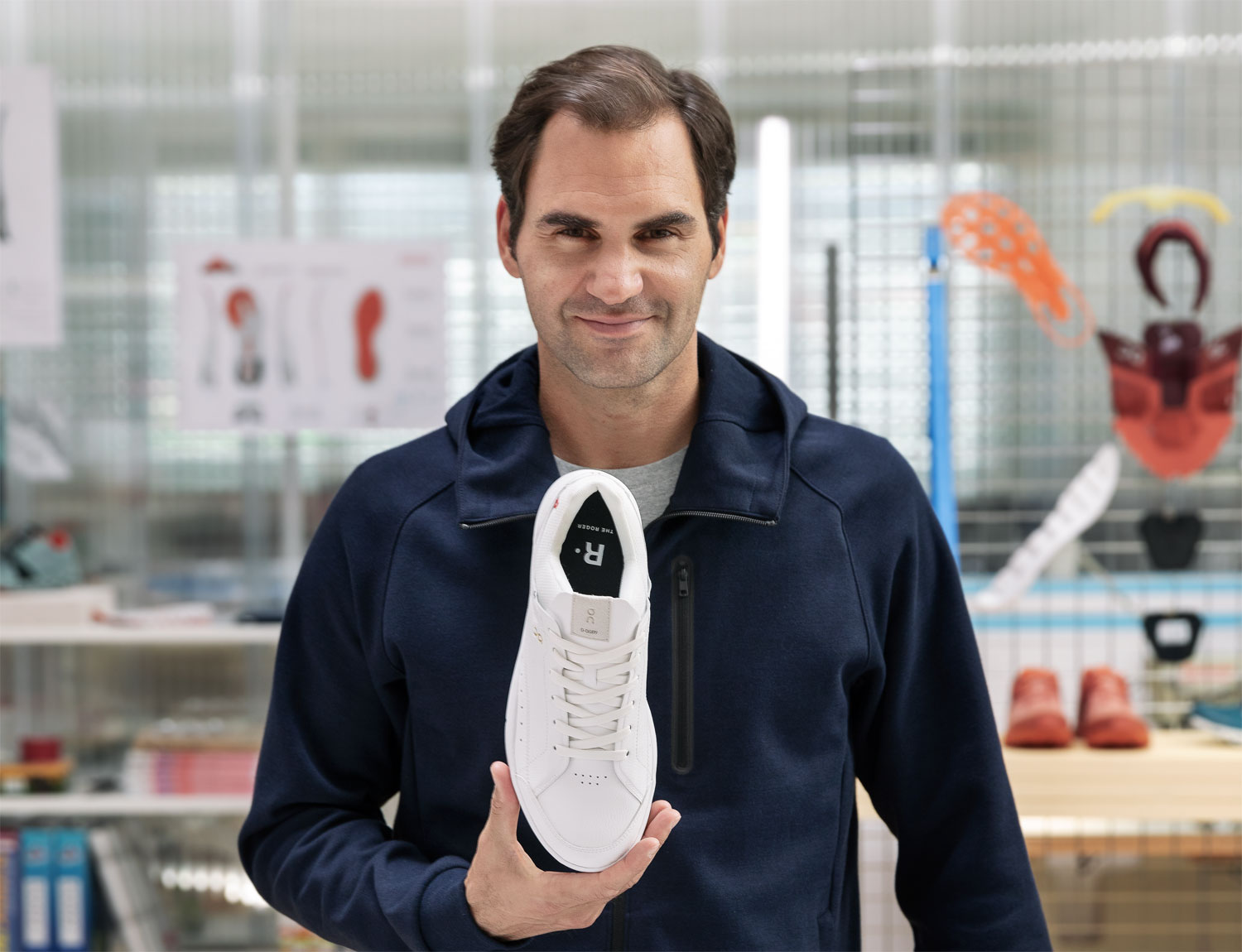Roger Federer Holding His New Sneakers