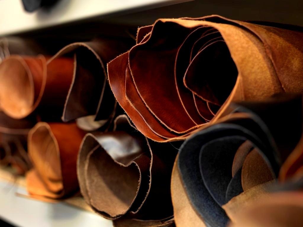 Sheets of rolled leather pictured up close