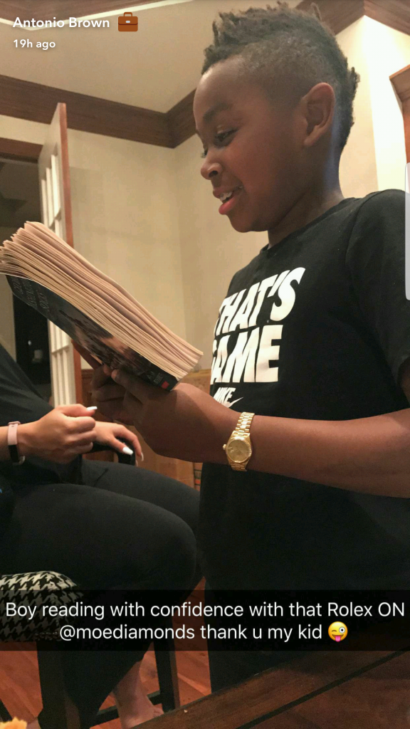 Antonio and his son right after he gifted a Rolex watch to his boy