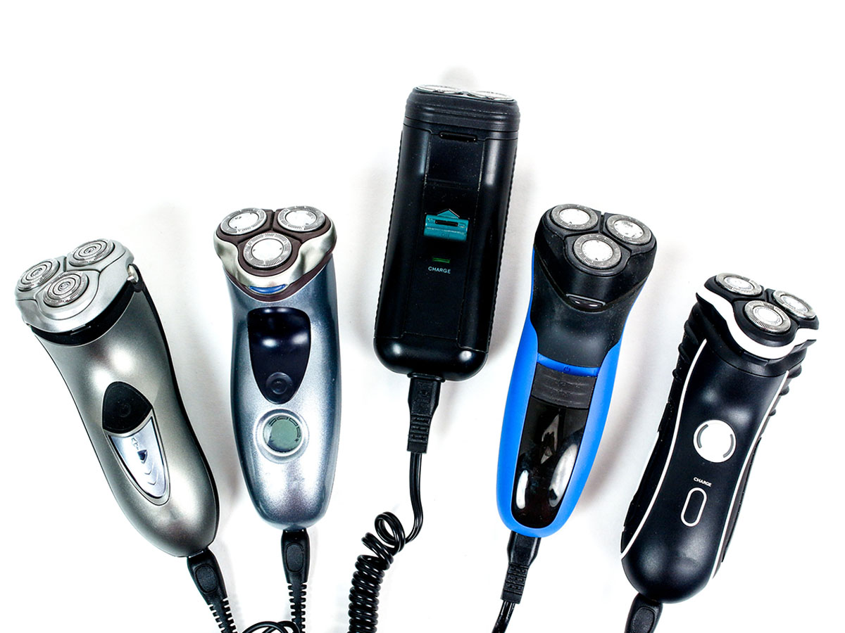 Five Electric Razors With Cords Isolated on White