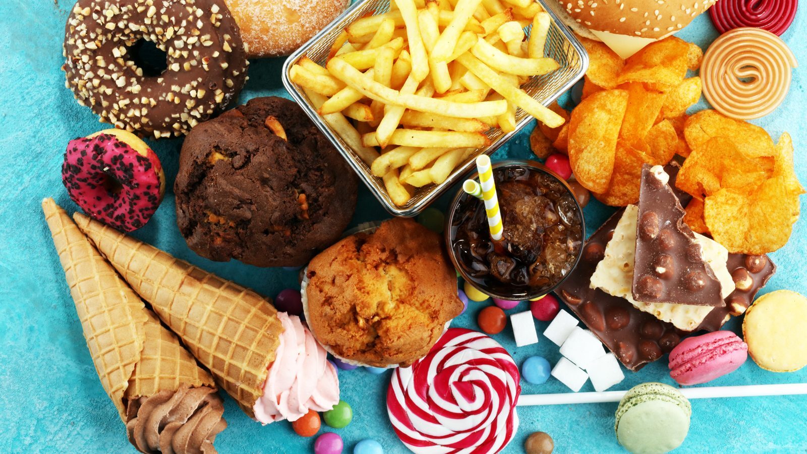 An assortment of processed carbs and junk food (fries, muffins, chips, etc.)